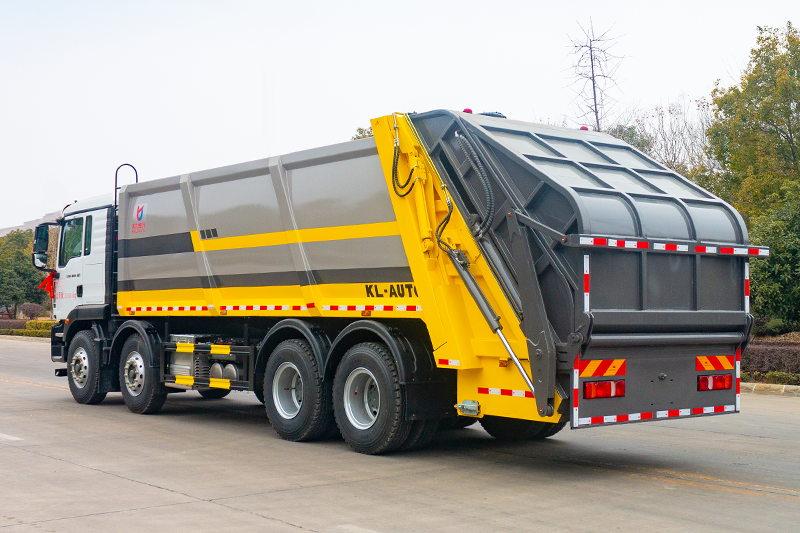 重汽汕德卡前四后八压缩垃圾车(25方)