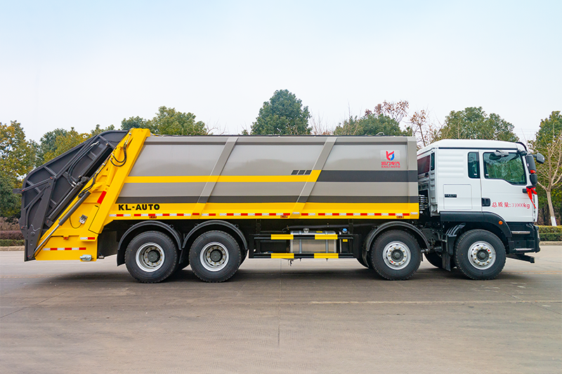 重汽汕德卡前四后八压缩垃圾车(25方)