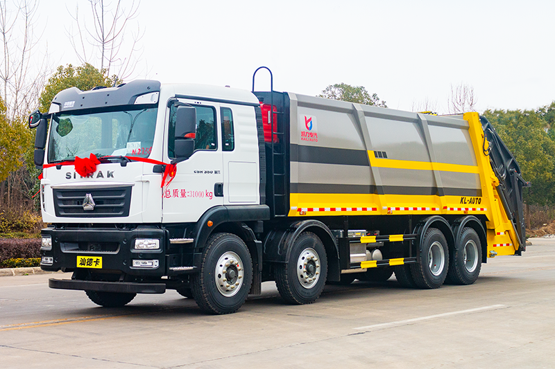 重汽汕德卡前四后八压缩垃圾车(25方)